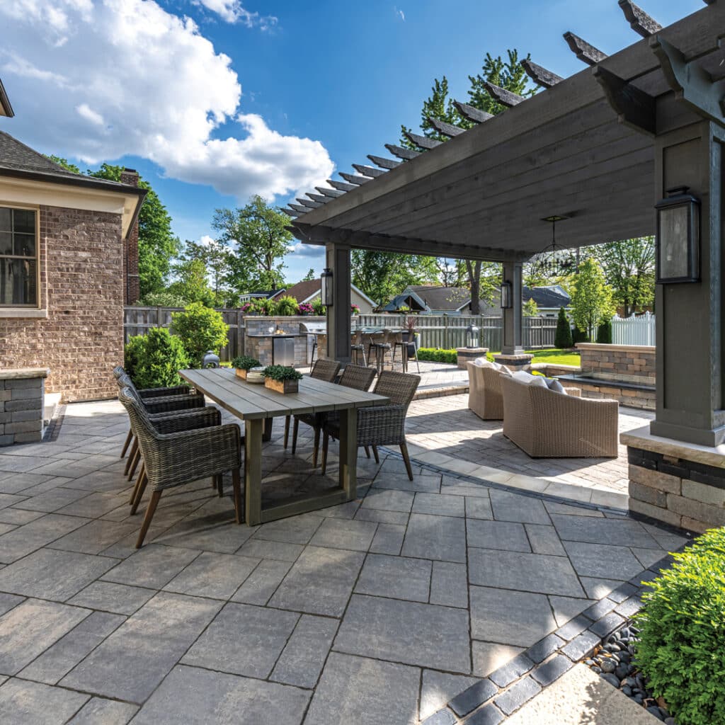 Dining set on large patio with pergola