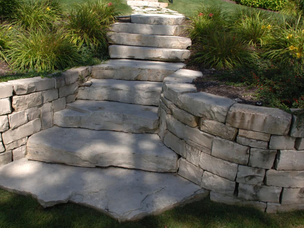 Eden outcropping for steps in stacked stone wall