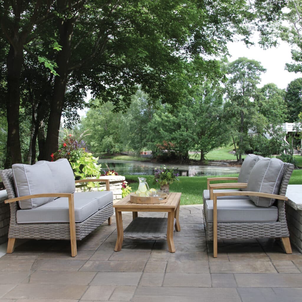 Seating and table furniture set on concrete paver patio