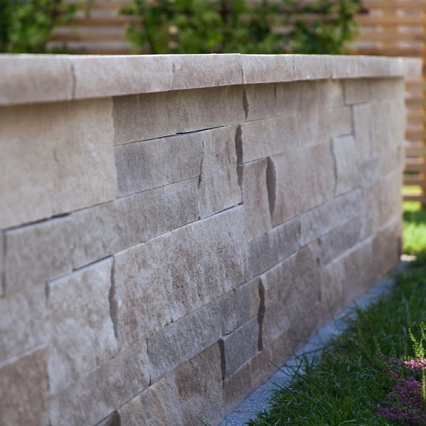 Locally sourced Indiana limestone cut drywall seat wall and coping