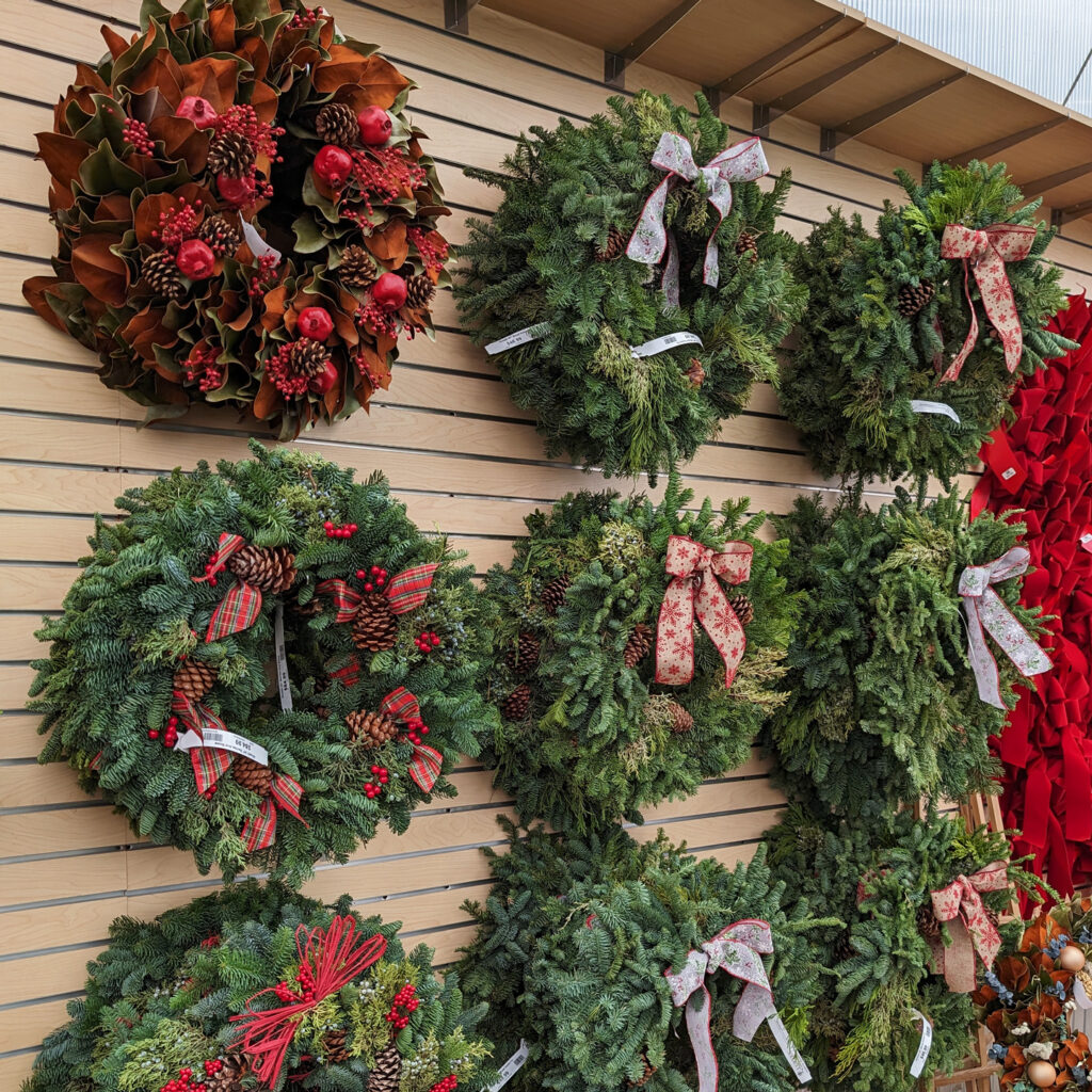 Wall of wreaths with bows